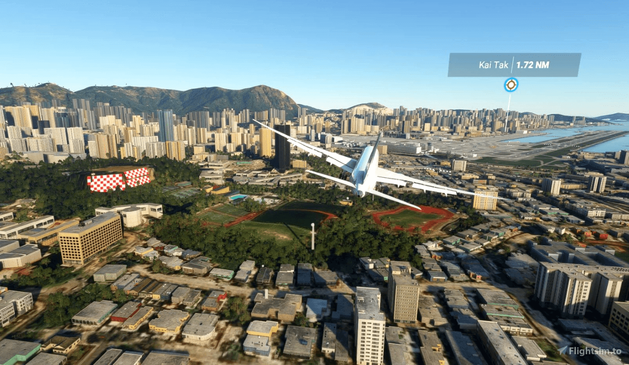 Plane flying over Kai Tai Airport